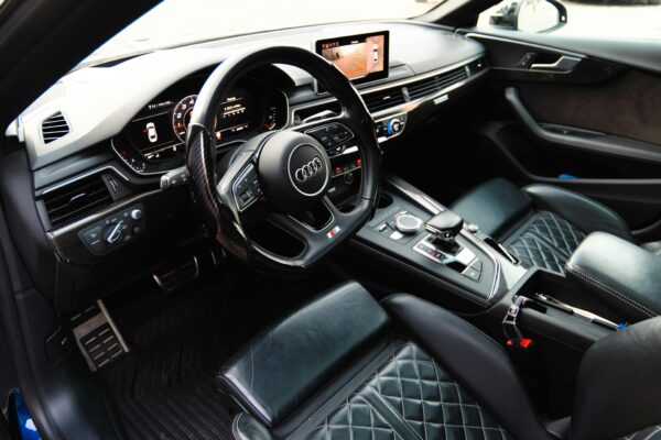 Audi Pre Sense: The Intelligent Safety System Redefining Modern Driving source : https://www.pexels.com/photo/luxury-car-interior-with-black-leather-seats-34404465/