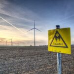 https://pixabay.com/photos/windmill-wind-energy-warning-sign-3979966/